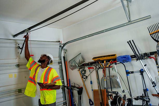 Professional Garage Door Panel Replacement technician working in Porterdale, GA